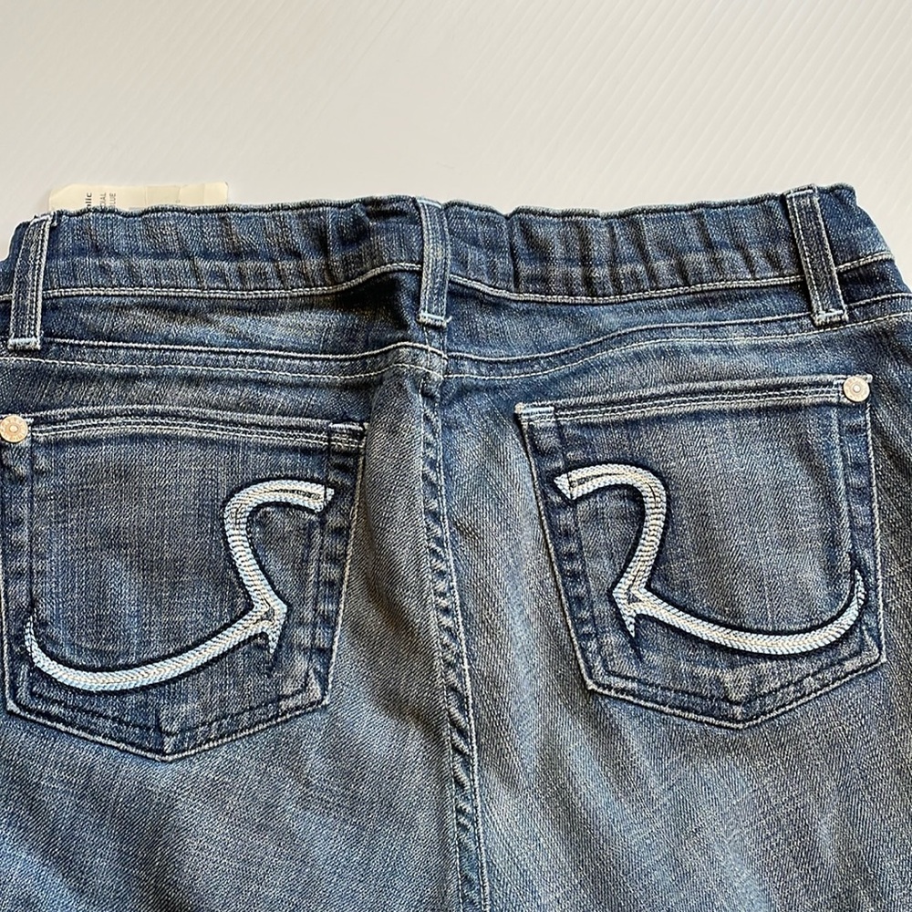 Rock & Republic radial blue, distressed flared jeans.  Size 27